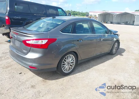 2014 Ford Focus Titanium from USA, damaged, VIN 1FADP3J23EL233221